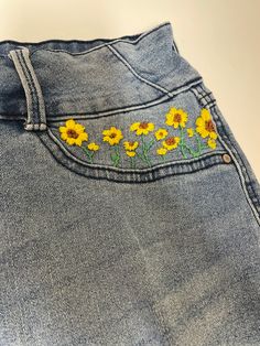 Floral Embroidered Straight Leg Jeans, Summer Floral Embroidery Straight Leg Jeans, Embroidered Yellow Cotton Bottoms, Casual High Waist Jeans With Floral Embroidery, Yellow Embroidered Cotton Bottoms, Light Wash Cotton Jeans With Floral Embroidery, Trendy Medium Wash Jeans With Floral Embroidery, Yellow Floral Embroidery Bottoms For Summer, Yellow Floral Embroidery Bottoms For Spring