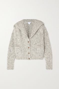 Bottega Veneta's slightly fluffy cardigan is knitted from alpaca-blend, enriched with plenty of wool for softness. It has defined ribbed trims and statement buttons. Luxury Sweater With Ribbed Neckline For Workwear, Marks And Spencer Wool Beige Coat, Miu Miu Luxury Casual Outerwear, Luxury Miu Miu Outerwear For Spring, Luxury Cream Sweater For Workwear, Affordable Zara Cotton Sweater, Affordable Cotton Zara Sweater, Bottega Veneta Jacket, Columbia Knit