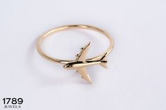 Here's Airplane Stacking Ring for Hostess! This 14K Solid Gold Aviation Female Pilot Band can be best Gift for Hostess, stewardess, flight attendant, air personnel! This 18K Minimalist Stackable Plane Ring is Loverlry Traveler gift for new Hostess or Women. 10K Traveler Ring will be perfect Hostess Bridal Shower Ring in her wedding or engagement ceremony. Dainty sky Plane Ring can be switched with her christmas night exciting moment. If you re looking Adventurer Ring, here's the stunning Airplane Ring for Women, girl friend or for yourself. This Airplane Ring will can be either Exciting Xmas Jewelry Gifted. This Sturdy Aviation Goldring has love & serves as a perfect gift for Future Hostess  & stewardess as well! You can check other stackable rings in here : https://www.etsy.com/shop/1789J Airplane Ring, Skyline Ring, Pilot Band, Shower Rings, Perfect Hostess, Aesthetic Rings, Female Pilot, Space Galaxy, Sparkly Things