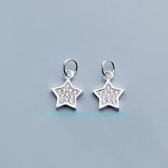 Sterling Silver Charm, Vermeil Charms, 925 Silver Star Charm Bulk Supplies Wholesale For Bracelet Necklace Q0254 Material: 925 sterling silver Color: silver  Size: 11*9*1.5mm Weight: 0.6g Please contact us if you need bulk! More star charms: https://www.etsy.com/shop/ClarenceJewelry?ref=seller-platform-mcnav&search_query=star+charmRing Blanks:  https://www.etsy.com/shop/ClareAccessories?section_id=33588047 Pendant Blanks:  https://www.etsy.com/shop/ClareAccessories?section_id=33438454 Charms:  https://www.etsy.com/shop/ClareAccessories?section_id=29352850 Findings:  https://www.etsy.com/shop/ClareAccessories?section_id=37786581 Necklaces:  https://www.etsy.com/shop/ClareAccessories?section_id=33438204 Beads:  https://www.etsy.com/shop/ClareAccessories?section_id=29620904 Earring Blanks:  h Elegant Silver Star Charm, Sterling Silver Star-shaped Charms, Silver Star Sterling Silver Charms, Silver Sterling Silver Star Charms, Silver Star-shaped Sterling Silver Charms, Silver Star Charm, Bracelet Charm, Star Charms, Silver Stars