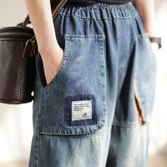 Details: Gender: Women Item Type: Jeans Material: Denim Season: Spring, Autumn Pattern: Patchwork Style: Casual, Loose, Retro Waist Type: Elastic Waist Size: One Size Waist: 64.00 - 100.00 cm/ 25.20 - 39.37 " Length: 88.00 cm/ 34.65 " Hip: 128.00 cm/ 50.39 " Hem: 34.00 cm/ 13.39 " Casual Patchwork Denim Blue Bottoms, Casual Denim Blue Patchwork Bottoms, Baggy Patchwork Cotton Jeans, Baggy Cotton Patchwork Jeans, Casual Denim Blue Patchwork Jeans, Casual Denim Blue Jeans With Patchwork, Casual Wide Leg Patchwork Jeans, Casual Dark Wash Bottoms With Patchwork, Casual Relaxed Fit Patchwork Jeans