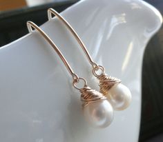 Pearl earrings, modern pearl earrings, wire wrapped pearl earrings, long gold earrings, gold filled earrings. $35.00, via Etsy. Modern Pearl Earrings, Freshwater Pearl Drop Earrings, Long Gold Earrings, Gold Pearl Earrings, Gold Filled Earrings, Pearl Gemstone, Modern Earrings, Pearl Drop Earrings, Bridesmaid Earrings