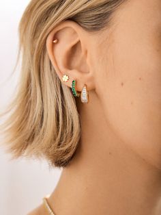 Upgrade your ear stack with some birthstone bling, courtesy of the 18K Gold Birthstone Huggie Earrings. Your signature birthstone gorgeously wraps around the gold huggie, making for an elegant, personalized accessory that’s sure to brighten up your ear stack. Crafted out of 18k gold plated sterling silver, this birthstone earring will dazzle for years. Yellow Gold Huggie Earrings With Birthstone For Gift, Gold Gemstone Cartilage Earrings As Gift, Elegant Gold Huggie Earrings With Birthstone, Gold Sterling Silver Huggie Earrings With Birthstone, Gold Gemstone Huggie Earrings, Gold Huggie Earrings With Gemstone, Trendy Cubic Zirconia Huggie Earrings As Gift, May Birthstone Huggie Earrings Gift, Gold Huggie Birthstone Jewelry