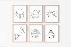 four framed pictures with different types of drawings on them