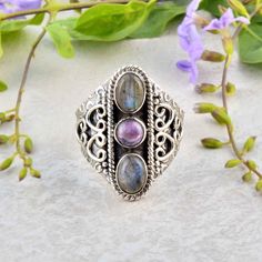 Labradorite and Amethyst Both Gemstone Ring, Triple Stone Ring, 925 Sterling Silver Ring, Vintage Labradorite Ring For Women, Handmade, boho Enjoy Free Shipping on All Orders Product Description:-  PRODUCT CODE     :-    SIZE           :-    All Size Are Available. Choose From Variation. METAL           :-    925 sterling Silver STONE                    :-    Labradorite, Amethyst STONE SHAPE        :-    Oval PURITY           :-    925  Ring can be customized on request and gemstone can be made to any gemstone you want. If You Need Faster Shipping, Please Contact us Please Make Sure to Include The Correct Address During Before Order. You Can return Item within 30 Days After Successful Delivery. We Offer 100% Money Back Guarantee If You Not Satisfied With Your Purchase. Return Charge Will Bohemian Moonstone Ring In Sterling Silver, Bohemian Oval Crystal Ring Nickel-free, Bohemian Oval Crystal Ring Nickel Free, Bohemian Style Oval Crystal Ring Nickel Free, Bohemian Moonstone Crystal Ring With Gemstone, Bohemian Oval Crystal Ring With Natural Stones, Oval Bohemian Crystal Ring With Natural Stones, Bohemian Silver Moonstone Ring With Gemstone Accents, Silver Bohemian Moonstone Ring With Gemstone Accents