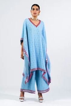 Shop for Vvani by Vani Vats Blue Georgette Embroidered Kaftan And Palazzo Set for Women Online at Aza Fashions Anarkali Kaftan For Eid In Blue, Blue Anarkali Kaftan For Eid, Navratri Designer Kaftan With Gota Work, Blue Kurta With Mirror Work In Traditional Drape, Blue Bollywood Kaftan For Navratri, Unstitched Blue Kaftan For Eid, Blue Straight Kurta Kaftan With Dabka Work, Blue Kaftan With Zari Work For Diwali, Traditional Blue Kaftan For Navratri