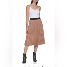 Calvin Klein Cafe Ole Tan Faux Leather Pleated Circular Swing Skirt Size Small New Feel Ravishing In This Faux Leather Pleated Skirt By Calvin Klein, Featuring A Top Band At The Waist And Voluminous Pleats. Product Details Elastic Waistband Unlined Imported Material & Care Faux Leather Dry Clean Only Calvin Klein Women's Faux Leather Pleated Circular Swing Skirt Cafe Ole Size Small Chic Calvin Klein Skirt For Workwear, Chic Calvin Klein Skirt For Work, Calvin Klein Skirt For Spring, Fitted Calvin Klein Casual Skirt, Calvin Klein Fitted Casual Skirt, Casual Fitted Calvin Klein Skirt, Elegant Spring Skirt By Calvin Klein, Calvin Klein Elegant Spring Skirt, Elegant Calvin Klein Skirt For Spring