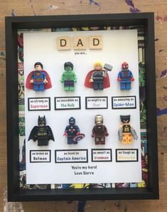 legos are displayed in a shadow box with the word dad spelled on it