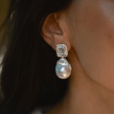 These large baroque pearl drop earrings are hand crafted and made of 14k gold-plating on 925 sterling silver, zircon stone and white baroque pearls. A dazzling zircon is studded in a lustrous natural fireball baroque pearl. Clear zircon, with its colorless allure, is also used in the upper sections of earrings. These pearl dangle earrings build a bridge between traditional materials and modern design.  You can use these real pearl stud earrings every day, as well as on special occasions with great pleasure. You love to wear these statement earrings with the hair up or down as they are statement-worthy either way.  It serves as the ideal complement to an evening dress, enhancing your overall look with its captivating charm. 💕 These handmade earrings are definitely unique and eye catching p Bridesmaid Earring, Pearl Drop Earrings Bridal, Earring Bridal, Earring Pearl, Bridal Earrings Pearl, Statement Earring, Pearl Earring, Real Pearls, Pearl Earrings Dangle