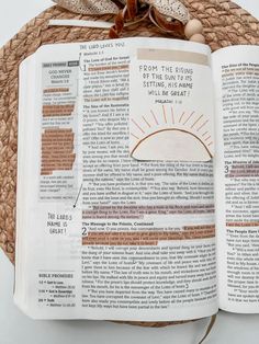 an open bible with the words from the livings of the sun rays on it