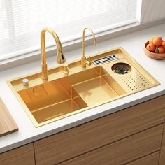 a kitchen sink with two faucets and a cutting board