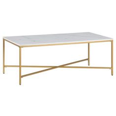 a white marble top coffee table with gold frame and metal legs, against a white background