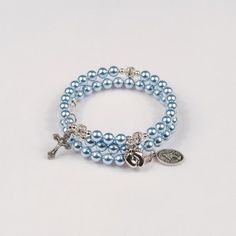 Adjustable Light Blue Jewelry With Spacer Beads, Spiritual Light Blue Jewelry With 8mm Beads, Elegant Adjustable Blue Rosary Bracelet, Blue Rosary Bracelet Gift, Adjustable Beaded Blue Rosary Bracelet, Adjustable Blue Beaded Rosary Bracelet, Handmade Adjustable Blue Rosary Bracelet, Blue Rosary Bracelet For Jewelry Making, Adjustable Light Blue Round Beaded Jewelry