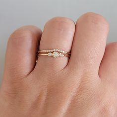 14k Solid Gold and Diamonds Minimalist Engagement Ring set, Wedding Rings, Stacking Ring , Bridal  Rings, Handmade Fine Jewelry Dainty Set, Diamond Engagement Ring plus Diamond Matching Band, the unique minimalist ring set for a wedding occasion. Absolutely perfect and comfortable for everyday wear, available in white gold, yellow gold, rose gold, 14k or 18k. ♥Ring features  Width :1.3 mm  Stones information  Type :Natural Diamond Shape:Round 2 side Diamonds :1.5 mm 1 center diamond : 2.5 mm  To Set Wedding Rings, Memory Ring, Rings Stacking, Black Stone Ring, Minimalist Engagement Ring, Rings Handmade, Handmade Fine Jewelry, Diamond Jewelry Designs, Initial Jewelry