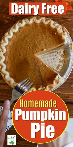 there is a pie on the table with a fork and knife in front of it