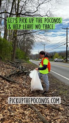 a man is picking up the poconos and help leave no trace