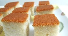 several pieces of cake sitting on top of a white plate