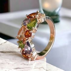 High quality Rose gold multi-stone gold plated ring available in US size 6, 7, 8 and 9, vintage ring Fancy, comfortable for every day wear, colourful engagement ring, promise ring, wedding ring, gorgeous stones on a rose gold fancy ring you will receive your order in a fancy gift package. Elegant Multicolor Open Crystal Ring, Elegant Multicolor Crystal Ring With Accent Stones, Colored Engagement Rings, Fancy Rings, Fancy Gifts, Gift Package, Stone Gold, Plated Ring, Ring Promise