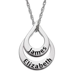 Sterling Silver Nesting Teardrop Names Necklace - 2 Names Featuring elegantly nesting stations, this personalized necklace makes a lovely gift for yourself or for a loved one on special days, or any day at all. Design Information Sterling silver pendant 2 nesting, open, teardrop-shaped stations 2 engraved names of your choice on surfaces, one on each station Personalized Silver Teardrop Necklace, Teardrop Necklaces For Mother's Day Anniversary, Sterling Silver Teardrop Charm Necklace For Anniversary, Personalized Teardrop Necklace For Mother's Day, Personalized Teardrop Necklaces For Mother's Day, Teardrop Engraved Necklace For Anniversary, Personalized Teardrop Wedding Necklaces, Engraved Teardrop Necklace For Anniversary, Personalized Teardrop Wedding Necklace