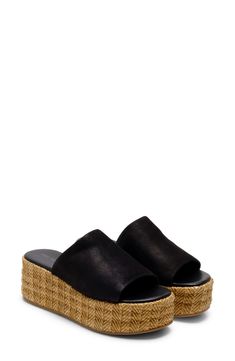 A woven raffia platform enhances the earthy vibes of this breezy and versatile sandal. 1 1/2" heel; 1" platform Synthetic upper/leather lining/synthetic sole Imported Summer Leather Espadrilles With Textured Footbed, Comfortable Straw Platform Wedge Sandals, Straw Wedge Sandals With Woven Sole, Straw Wedge Heel Sandals With Woven Sole, Straw Sandals With Woven Sole And Wedge Heel, Wedge Heel Sandals With Woven Straw Sole, Natural Wedge Heel Sandals With Textured Sole, Natural Color Wedge Heel Sandals With Textured Sole, Leather Platform Slippers For Vacation