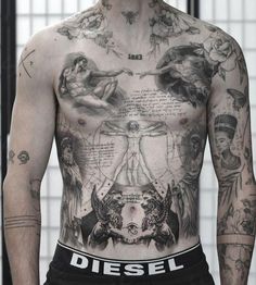 a man with many tattoos on his chest