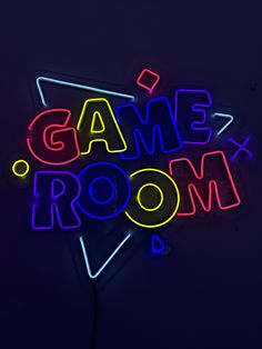 a neon sign that says game room 4