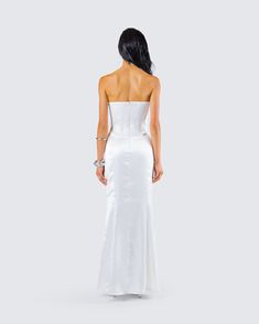 They’ll all be getting down on one knee when they see you in this dress 💍 Made from soft satin fabric, this gorgeous white lace appliqué gown, complete with a fit and flare style and corset boning, will leave a trail of admirers in your wake 🤍 White Strapless Dress For Gala During Prom Season, Formal Satin Dress With Lace Back, Floor-length Satin Dress With Lace Back, White Lace Bodice Fitted Dress, Fitted Gown With Lace Back, Fitted Gown With Lace Bodice, Satin Gown With Lace Bodice For Party, Satin Evening Dress With Lace Bodice For Gala, Fitted White Maxi Dress With Lined Bodice