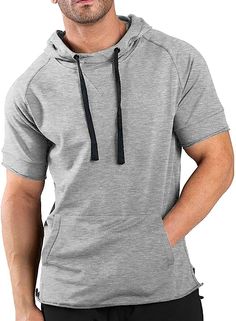 This men's athletic drawstring short sleeve hoodie is perfect for fitness and outdoor activities. Made with an ultra-lightweight breathable cotton blend fabric, this hoodie provides superior comfort and quick-drying performance to keep you dry and cool. The adjustable drawstring waist lets you customize your fit and coverage. Cotton Blend Imported Lace Up closure Machine Wash Material: This short sleeve hoodie is made of soft, breathable and lightweight sweat-absorbent cotton blend fabric. Absor Athletic Fit Casual Hooded Hoodie, Casual Hoodie For Gym, Casual Hoodie Sweatshirt For Light Sports, Casual Sports Hoodie Activewear, Casual Hoodie For Light Sports, Hooded Cotton T-shirt For Sports, Hooded Activewear With Drawstring Hood For Gym, Athletic Heather Cotton Sweatshirt For Gym, Sportswear Cotton Hoodie With Drawstring