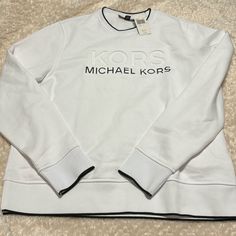 Nwt White Michael Kors Crewneck Sweatshirt White Crew Sweatshirt With Logo Detail, White Crew Sweatshirt With Logo, White Crew Neck Sweatshirt With Logo, White Long Sleeve Sweater With Logo, White Logo Sweater For Fall, White Logo Crew Neck Sweatshirt, White Tops With Logo For Fall, White Tops With Logo Detail For Fall, White Cotton Logo Sweater