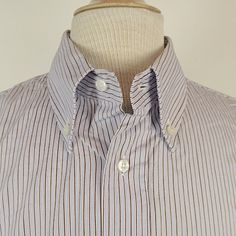 Loro Piana 100% Cotton Shirt..Made In Italy Size 18, .Button Front ..Button Cuffs And Button Down Collar..Blue Gray And Brown Fine Stripes Condition: Mint Measures Length 32.5 Shoulder 20 Sleeve 22.5 Underarm To Underarm 24 Business Top With Buttons And Spread Collar, Semi-formal Button-up Dress Shirt, Business Casual Shirt With Collar And Buttons, Semi-formal Tops With Buttons And Fold Down Collar, Office Shirt With Buttons And Fold Down Collar, Classic Office Shirt With Snap Buttons, Office Shirt With Spread Collar And Buttons, Office Shirt With Spread Collar, Semi-formal Shirt With Buttons And Fold Down Collar