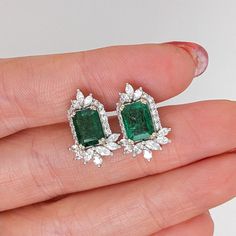 These beautiful stud earrings feature a pair of 2.58 carat weight Emerald gemstones with natural earth mined diamonds set in solid 14K gold. These Emerald studs make a lovely May birthstone gift for your loved ones! These earrings are made with solid 14k Gold and natural earth mined SI / G-H Diamonds. As listed, these earrings are ready to ship. If you're interested in purchasing this setting with a different center stone please message us! Luxury Emerald Earrings For May Birthstone, Emerald Stud Earrings With Diamonds, Gold Emerald-cut Earrings For May Birthstone, Emerald Cut Diamond Earrings, Emerald Cut Stud Earrings, Multi-stone Emerald Earrings For Gift, Green Emerald Multi-stone Earrings, Blue Stud Earrings, Beautiful Stud Earrings