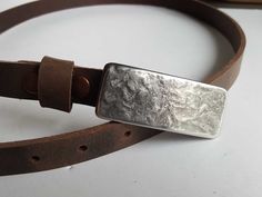 Hand forged buckle is paired with a 7/8" belt. Each buckle is a signed original Buckle is one of a kind, made in Canada.  Most of the buckles on our site can be made to fit a 7/8" belt. If you have a specific texture you would like on your buckle, please send us a link. We will send you a custom order. View our entire selection of belts & buckles at the following link: https://www.etsy.com/ca/shop/ironartcanada Please email for an exact shipping quote prior to making your purchase. Kilt Belt, Custom Belt Buckles, Handmade Belts, Custom Belt, Work Gear, Brown Belt, Suspender Belt, Unisex Gifts, Leather Belts