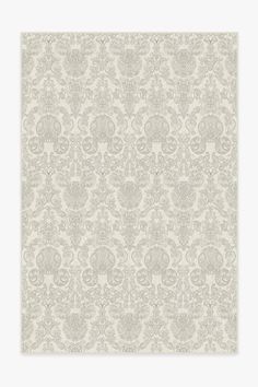 a white and grey wallpaper with an ornate design