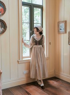 Your everyday dress for life in the Renaissance era. This set features an off shoulder midi dress with a subtle plaid pattern, crochet details and long puff sleeves, and a lace up corset. Concealed back zipper on dress. DressS: 33" chest, 26.5" waist, 45" lengthM: 34.5" chest, 28" waist, 45" lengthL: 36" chest, 29.5" waist, 45.5" lengthXL: 37.5" chest, 31" waist, 45.5" length CorsetOne Size: 30"-40" chest, 13"-17" length Vintage Square Neck Dresses For Fall, Dark Academia Fitted Dresses For Spring, Fitted Dark Academia Dresses For Spring, Fitted Spring Dress In Dark Academia Style, Long Sleeve Dark Academia Dresses For Fall, Dark Academia Long Sleeve Dresses For Fall, Cottagecore Long Sleeve Prairie Dress For Fall, Long Sleeve Prairie Dress With Lace Trim For Fall, Fall Long Sleeve Prairie Dress With Lace Trim