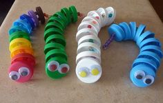 the caterpillars are all different colors and have googly eyes on them