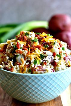 loaded bacon ranch potato salad in a blue bowl