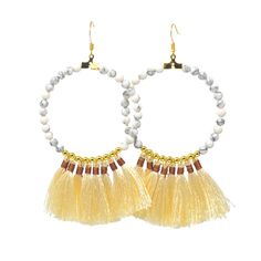 Add some spice to life with these adorable Ivory Tassel Hoop Earrings! A versatile style that is light-weight and easy to wear on vacation or any day of the year. Bohemian White Hoop Earrings For Beach, Beige Tassel Jewelry For Beach, Bohemian White Tassel Earrings For Pierced Ears, White Beaded Tassel Earrings For Beach, Bohemian Beige Earrings For Vacation, Beige Bohemian Earrings For Vacation, Summer Vacation Dangle Hoop Earrings, Tassel Dangle Hoop Earrings, Handmade White Hoop Earrings For Summer