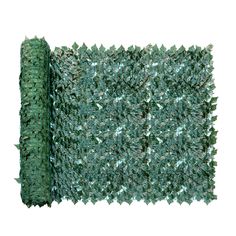 a roll of green grass on top of a white background