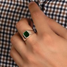 Unleash your inner style icon with our Emerald Silver Ring, a bold and striking jewelry masterpiece. At MyJewelist, we are here to redefine your style, offering you a unique piece that reflects your individuality and adds a touch of cool sophistication to your look. Our Emerald Silver Ring isn't just an accessory; it's a reflection of your distinctive style. When you wear it, you'll radiate confidence and charm, effortlessly grabbing attention wherever you go. ० UNMATCHED COMFORT, IMPECCABLE STYLE ० Concerned about comfort? No worries! Our jewelry is meticulously designed with your comfort in mind. We exclusively use hypoallergenic, nickel-free materials, ensuring you look and feel your absolute best. ० DETAILS ० ★CRAFTED TO PERFECTION: The Ring is a testament to precision and craftsmanshi Modern Green Signet Ring For Anniversary, Modern Emerald Ring With Polished Finish As Gift, Modern Emerald Ring With Polished Finish For Gift, Modern Emerald Ring For Gift, Modern Polished Emerald Open Ring, Modern Sterling Silver Emerald Open Ring, Modern Sterling Silver Open Emerald Ring, Modern Polished Emerald Ring For Gift, Modern Polished Emerald Ring Gift