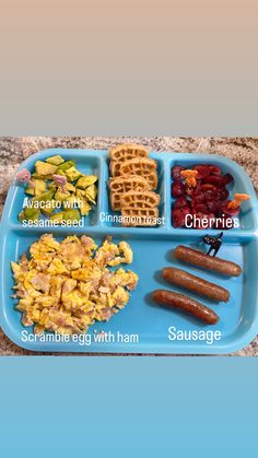 a blue tray filled with different types of food