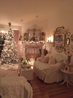 a living room filled with furniture and a christmas tree