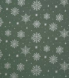 a green background with white snowflakes on it