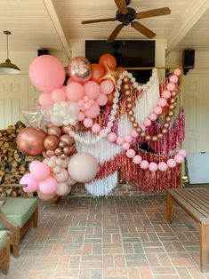 balloons and streamers are hanging from the ceiling