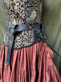 Welcome to Fierce Eagle Leather Creations on Etsy! Black or Brown Leather Wand Holster. Adjustable to fit many styles and sizes of wands. This holster will fit up to a 2 inch belt. International orders will be refunded for shipping overages. Interested in something similar but this isn't quite it? Message me and I'll custom make. Wand Holder Belt, Ren Fair Belt Accessories, Wand Holsters, Wand Holster, Harvest Witch, Witches And Warlocks, Wizard Cosplay, Wand Holder, Ren Faire Outfits