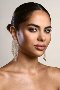 Defined by swaying rows of diamante tassels, these aptly-named earrings are guaranteed to set the sparkle standard at your next event. Try styling Waterfall with a sleek bun to show off all these gold earrings have to offer.Features - Gold toned - Diamante embellishments- Curved design- Tassel detail - Stud fastening Product Information Designed exclusively by Club L London Gold-toned brass (60% Brass, 40% Glass) SKU: CL134513007 Returns InformationEarrings and pierced jewellery cannot be returned for health and hygiene reasons. Health And Hygiene, Gold Tassel Earrings, Club L London, Pregnant Wedding, Sleek Bun, Platform Heels Boots, Wedding Shoes Bride, Black Tie Gala, Tassel Drop Earrings