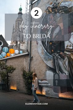 a woman standing in front of a mural with the words 2 day itinerary to breda