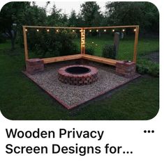 an outdoor fire pit with lights around it and the words wooden privacy screen designs for