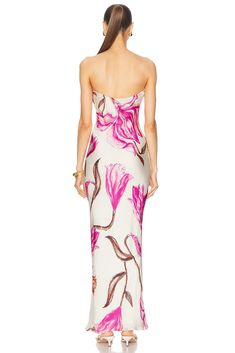 This exquisite dress, made from 100% viscose, features a beautiful floral stamp that exudes elegance and charm. Crafted in India, it boasts a fully lined interior for ultimate comfort and a hidden side zipper closure for a seamless look. Perfect for any special occasion, this dress is a stunning addition to your wardrobe. Chic Floral Print Maxi Dress For Gala, Silk Floral Print Midi Dress For Evening, Floral Print Maxi Strapless Dress For Garden Party, Fitted Strapless Floral Maxi Dress, Chic Silk Midi Dress With Floral Print, Fitted Sleeveless Silk Dress With Floral Print, Fitted Silk Floral Midi Dress, Fitted Floral Print Silk Evening Dress, Fitted Silk Floral Print Dress For Evening