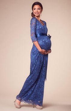 For a dazzling pop of regal colour, our Katie Maternity gown in Windsor Blue is the perfect partner to your after dark season’s party invites. With a beautifully shaped scooped neckline and floor length skirt lined in premium jersey, our sweeping, full length lace maternity gown will become a cherished part of your evening wardrobe. The ¾ sheer sleeves make it flattering and ideal for the cooler months while the elegant stretch floral lace provides all the opulent detail you desire. We’ve includ Fitted Floor-length Maternity Dress For Prom, Blue Floor-length Maternity Gown, Floor-length Blue Maternity Gown, Elegant Floor-length Maxi Dress For Maternity, Elegant Blue Maxi Maternity Dress, Blue Fitted Maternity Dress For Wedding, Blue Floor-length Maternity Dress, Elegant Blue Floor-length Maternity Dress, Blue Maxi Length Maternity Dress For Wedding