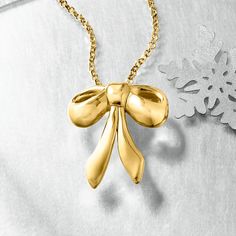 Ross-Simons - Italian 18kt Gold Over Sterling Bow Pendant Necklace. 18". Direct from Italy, our darling 18kt yellow gold over sterling silver bow necklace is right on trend. Uplift your look with this pretty ribbon pendant, bright with a high-polished finish and suspended from a classic rolo chain with a 2" extender. Lobster clasp, 18kt gold over sterling bow pendant necklace. Elegant Sterling Silver Jewelry For Holidays, Elegant Jewelry For Celebration And Gift, Elegant Necklaces For Mother's Day Celebration, Formal Yellow Gold Necklaces For Gifts, Elegant Yellow Gold Necklace As A Gift, Elegant Yellow Gold Necklace For Gift, Elegant Necklace For Mother's Day Celebration, Elegant Holiday Gift Jewelry, Elegant Holiday Necklaces For Celebrations